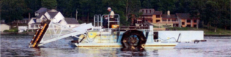 weed harvester at work